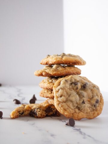 gluten free chocolate chip cookies stacked on top of each other