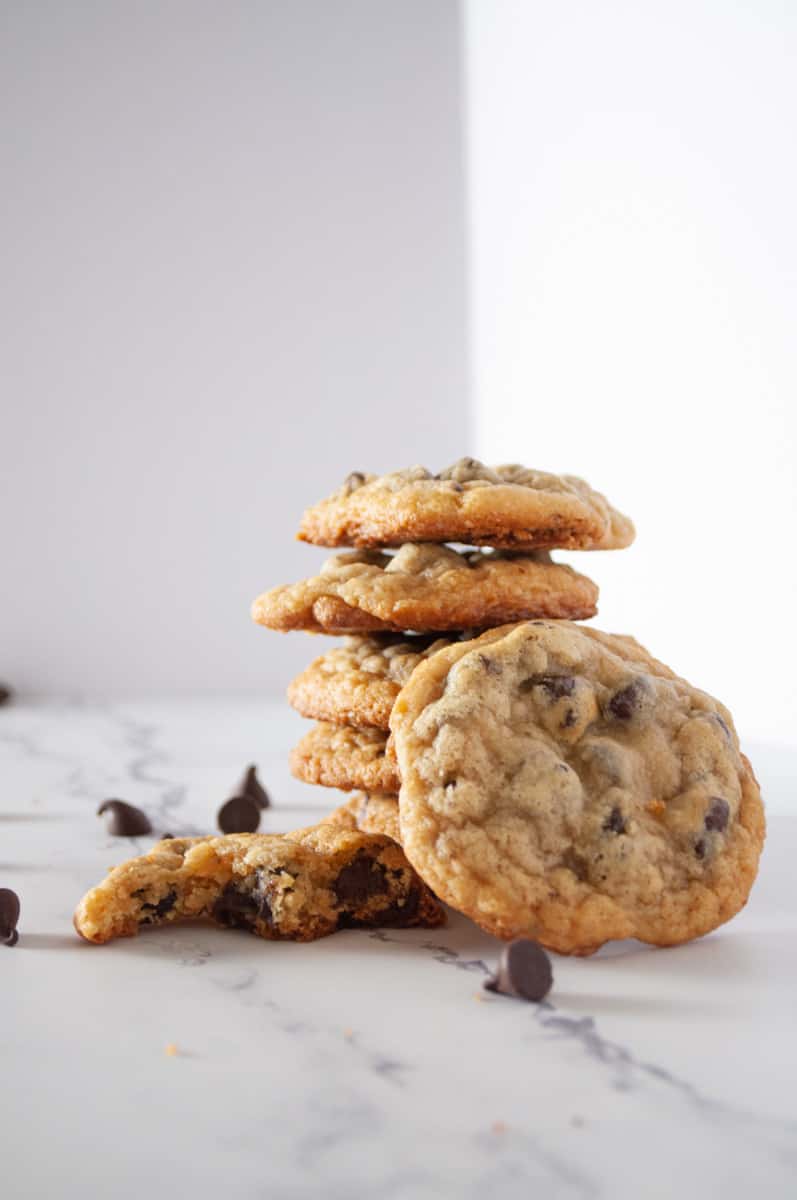 gluten free chocolate chip cookies stacked on top of each other