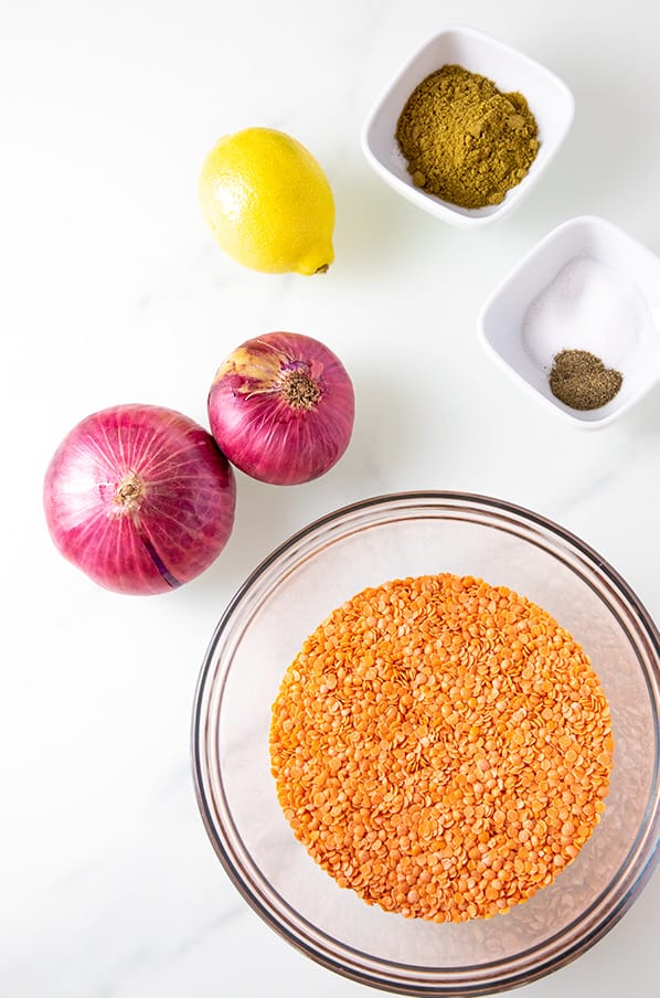 red lentil soup ingredients such as lemon, onions, red lentil and spices. 