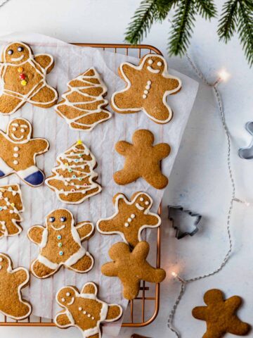 gluten free gingerbread cookies decorated with royal icing